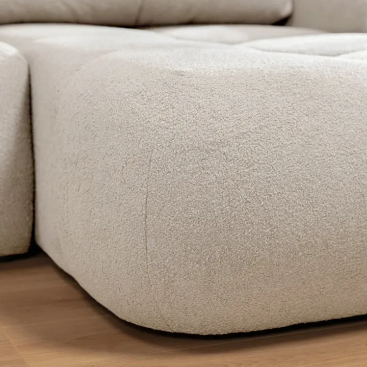 Divano letto con angolo a destra 4 posti 270x173cm con contenitore tessuto bouclé bianco crema Litos